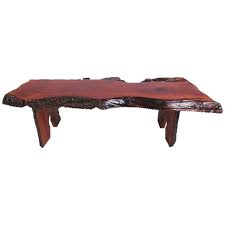 Slab coffee table should always look refreshing, unique and elegant, as that is where you would sit for a fresh cup of coffee and feel rejuvenated. Vintage Live Edge Tree Slab Coffee Table Coffee Table Walnut Slab Coffee Table Tree Slab