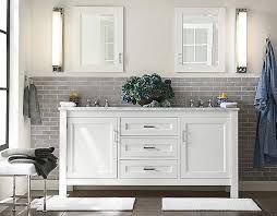 Knotted rugs lend a bohemian or california flavor to a bathroom, especially when you have lots of cool surfaces, like stone, marble or tile. Pottery Barn Bathroom Ideas Design Corral