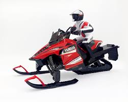 You can follow the easy steps in the video or the images below. 1 6 Rc Yamaha Snowmobile Toys R Us Canada