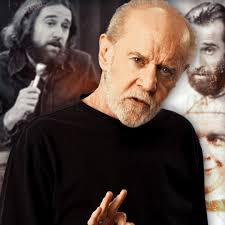 In 1975, George Carlin made television history as the first-ever host of  what would become Saturday Night Live. Known for his sharp wit and fearless  commentary, Carlin delivered multiple stand-up segments throughout