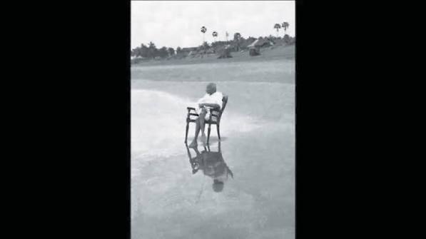 1944: Mahatma Gandhi with his son Devdas at the Juhu Beach, Mumbai.
