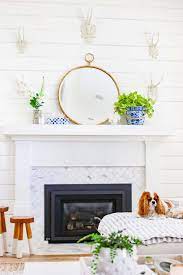 The mantel is an underestimated fireplace feature that can set the tone in any living space. Summer Mantel Decor In Blue And White Modern Glam