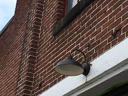 Warehouse Outdoor Light Brick Warehouse Building With Old School Industrial Light Industrial Lighting Outdoor Lighting Light