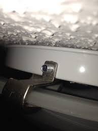 The flush mount lighting fixture works with most dimmer switches so you can adjust the brightness to the perfect light level. How Can I Change The Bulb In This Three Clawed Ceiling Mounted Dome Light Fixture Home Improvement Stack Exchange