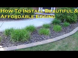 Gardens gain a distinctive magnetism through edging. How To Install A Beautiful And Affordable Paving Stone Edging Stone Landscaping Garden Edging Stone Edging