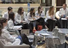 Medical Students Sitting In A Circle Taking Notes Medical Students Medical School Life Patient Advocacy