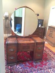Do not contact me with unsolicited services or offers. 1930s Waterfall Vanity With Original Round Mirror My Antique Furniture Collection