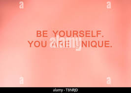 Abstract Coral Pink Color Blurred Background Text Be Yourself You Are Unique Stock Photo Alamy