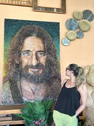 This is unreal. Made entirely from shards of glass and plastic, this  incredible portrait of Jonathan Roumie as Jesus was crafted by a fan in Rio  de Janeiro, Brazil.
