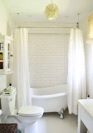 Clawfoot tub designs typically feature cast iron and porcelain construction, but today they also can be made of fiberglass, acrylic or other lightweight modern materials. House Crashing Breezy Bright Young House Love Bathroom Inspiration Clawfoot Tub Shower Bathroom Design