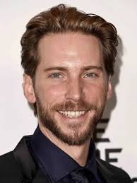For those interested, this is Troy Baker. He joins Joaquin Phoenix, Sean  Patrick Flanery, Corey Carrier and George Hall as actors other than  Harrison Ford who have portrayed Indiana Jones. Joaquin Phoenix
