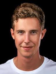 7-footer Page left pro beach volleyball, built a company, and now he's back