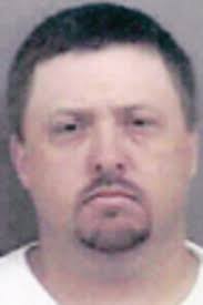 Softball coach charged with child molestatio