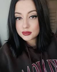 Hi! I work in finance and I'm updating my LinkedIn. Can someone help me  make this photo look a bit more… CFO-ready? 😂📈 Thanks in advance!