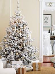 The winter wonderland theme is centered around a snowy, cold weather feeling mixed with the ideas of magic and comfort. Flocked Christmas Tree Via Peeking Thru The Sunflowers Blog Flocked Christmas Trees Flock Christmas Tree Beautiful Christmas Trees