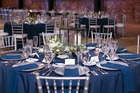 The dishes are from a 6 place setting i've had for a few years. Modern Elegant Wedding Reception Decor Round Table With Navy Blue Linens Silver Chiavari Chairs And Chargers Black Lantern With White Flowers And Greenery Centerpiece Tampa Bay Wedding Photographer Carrie Wildes Photography