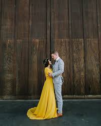It was made of white spun silk and satin with honiton lace accents, and her head was topped with a wreath of orange blossoms and myrtle instead of a crown or tiara. Bright Yellow Wedding Gown Bright Yellow Wedding Bright Wedding Wedding Southern California