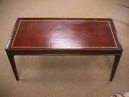 Inspired by the contemporary style, it comes with a leatherette round tufted top with pirelli webbing for firm support. 1950 S Vintage Leather Top Coffee Table Mar 23 2004 Auctions Neapolitan In Fl Leather Top Coffee Table Antique Coffee Tables Antiquing Furniture Diy
