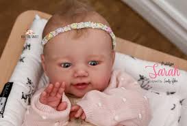 Available Next Week! Prototype "Sarah” by Sandy Faber. This sweet toddler  sculpt is 24 inches long, realistically weighted, and adorably pose-able  with full armature. She goes home with everything pictured. To be