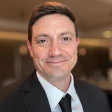 What could be causing a sandy texture in baked goods?