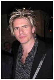 Nigel John Taylor was born June 20, 1960 and is the bass guitarist and co-founder of ... - precious_border