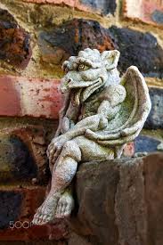 With Apologies To Auguste Rodin This Handsome Gargoyle Thoughtfully Expresses His Opinion About The Day As It Guards A Home In Fort Worth Te Statui Skulptura