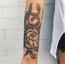 For example, if you consider yourself as a dangerous woman then add a snake to your flower vine tattoo like this. Amazing And Unique Arm Tattoo Designs For Women Arm Tattoo Designs Amazing And Unique Arm Tattoo Women Arm Tattoo Tattoos Arm Tattoo Arm Tattoos For Women