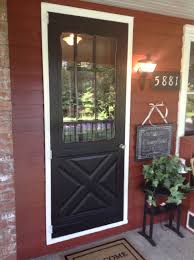 our red farm house newly painted black front door exterior door colors red house exterior house colors