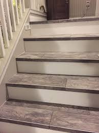 Wood Look Tiled Stair Case Diy Stairs Stair Remodel Tile Stairs