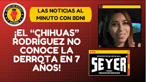 A young mexican boxer competing in a bout . Koq5cuw6coc0mm