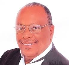 Komal “Koey” Wayne Smith