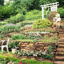 Erect a retaining wall 6 /11 you can make a sloping property more functional by cutting away a portion of a hill and installing a retaining wall to hold back the soil. Hillside Landscaping Ideas Sloped Garden Sloped Backyard Hillside Landscaping