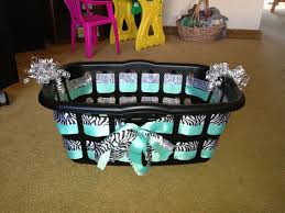 Plastic buckets come in a wide variety of sizes and colors, but they are not usually decorated. Wishing Well For Baby Shower Ever Guest Puts Their Wish For Baby In The Basket Baby Shower Baskets Baby Shower Gift Basket Baby Shower Diy
