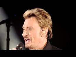 Et c'est la chanson du bon dieu celle qui rend le cœur heureux celui qui la chante au passage l'aura toujours en bagage (pierre bachelet). Johnny Hallyday Et Maintenant 2009 Lyrics Youtube