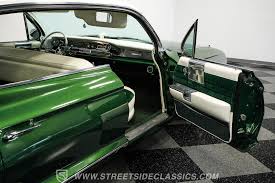 Image result for Granada Green 1961 Cadillac