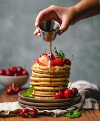 Creative pancake art and beautifully plated fluffy pancakes showcasing modern food presentation trends for the best pancake recipe