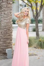 The Elsa Features A Short Sleeve Round Neckline Bodice That Is Covered In Tiny Gold Sequins And Followed With Images Modest Bridesmaid Dresses Prom Dresses Modest Dresses