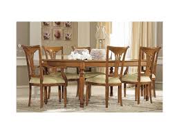 Oak extending dining table, the oval top fitted with telescopic action opening to incorporate two original additional leaves. Camel Siena Day Cherry Italian Extending Dining Table With 4 Chairs And 2 Armchair