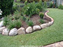 Again, mixing up the textures and materials is polished river rock borders make fantastic edging for pathways. Brick Garden Edging Photograph Rock Landscape Edging Wallp Landscape Edging Landscaping With Rocks Garden Edging