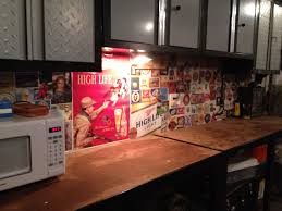 Garage Wall Back Splash Beer Coaster Instead Of The License Plates Putting A Collection To Work And Out Of The Drawer Garage Walls Beer Coasters License Plate