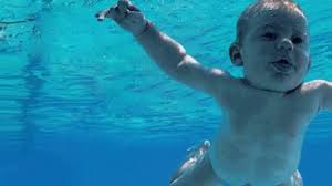 The baby — now man — who appears on the cover of nirvana's nevermind has filed a lawsuit against the band and others involved in the photograph, claiming the image constitutes child. Mougpvvf0 Uvmm