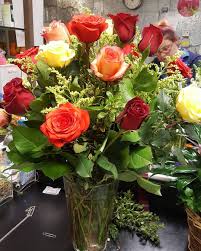 Busy Working With The Beauty Rose Flower Arrangements Floral Arrangements Flower Arrangements