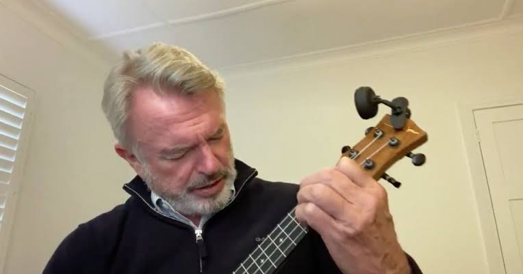 Please Enjoy This Video Of Sam Neill Playing 'Uptown Funk' On A Ukulele While Self-Isolating