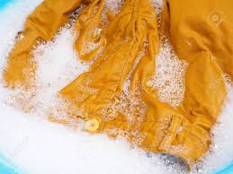Colored clothing should be washed many times before washing with white clothes. Hand Wash Colored Clothes With Yellow Pants Soaked Washing With Stock Photo Picture And Royalty Free Image Image 149497015