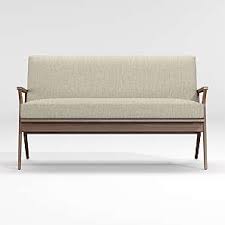 Suitable for a variety of different a modern update on a classic design, this swoop arm settee bench is more than just a charming place to take a seat. Loveseats Crate And Barrel