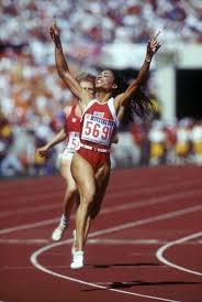 Olympic games gold medalist athlete. 20 Inspiring Moments In Olympic History Flo Jo Female Athletes Olympic Athletes