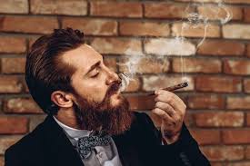 Many of them either free or covered by health insurance plans. Premium Photo Close Up Portrait Of A Handsome Lovely Man With A Mustache And Beard Smoking A Brown Cigar