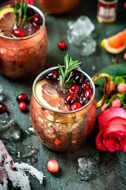 Garnish each glass with a sprig of rosemary and pomegranate seeds. Grapefruit Bourbon Yule Mules Host The Toast