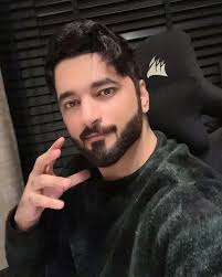 A Love's Longing" The moon whispers through my window pane, casting shadows  in its silvery reign. But in this darkness, only you I see, a longing in my  heart, a wish for