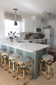 Turning My White Laminate Builder Grade Kitchen Into A Green And White Two Toned Kitchen Cuckoo4design Painting Kitchen Cabinets White Interior Design Kitchen Painting Kitchen Cabinets